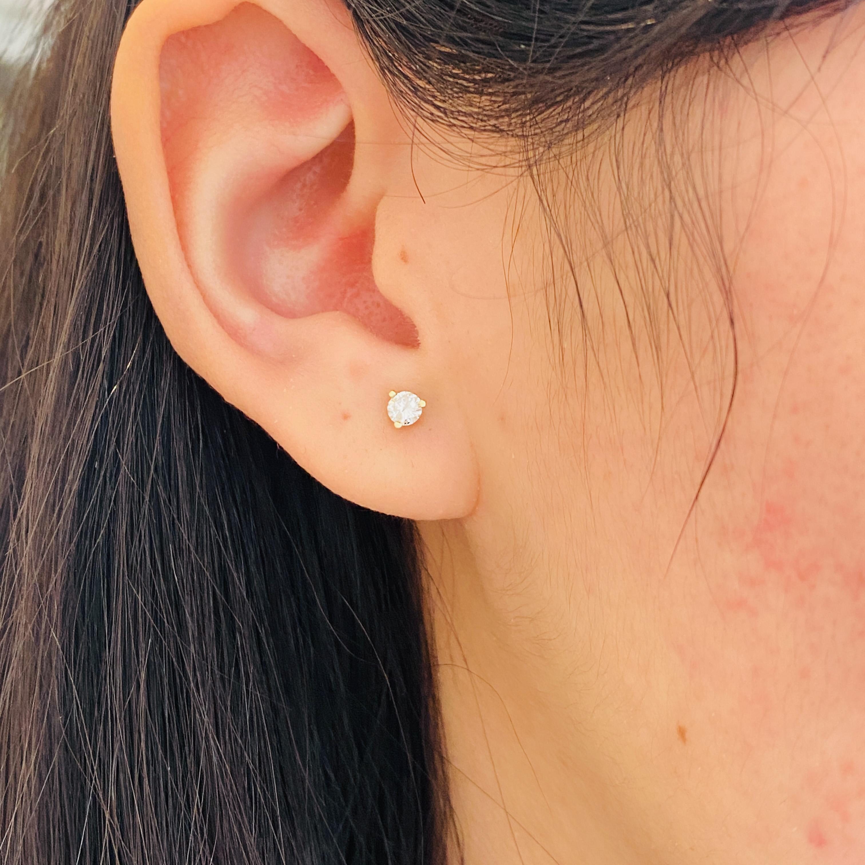 These gorgeous and petite diamond stud earrings are perfect for any ear. They look wonderful whether you wear them alone or as an accent next to larger earrings! Martini studs are popular because they have a low profile close to the ear and still