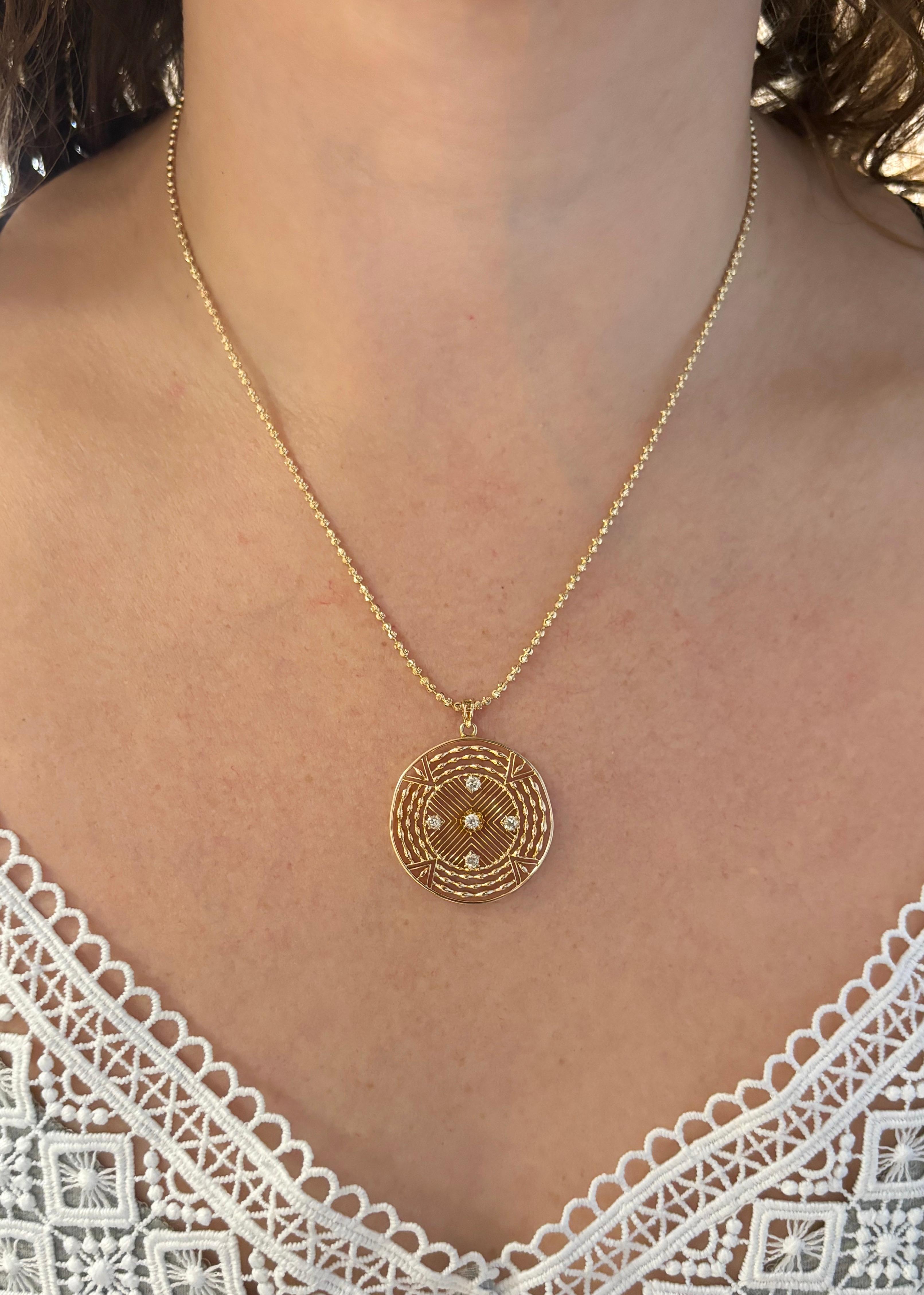 Diamond medallion pendant necklace made in 14k yellow gold. 
 
Gemstone: Earth Mined Diamond
Total Diamond Carat Weight: .32CTW
Diamond Cut: Old Miners Cut 
Color: Average G-H
Clarity: Average VS-SI
Metal: 14K Yellow Gold 
Necklace Length: