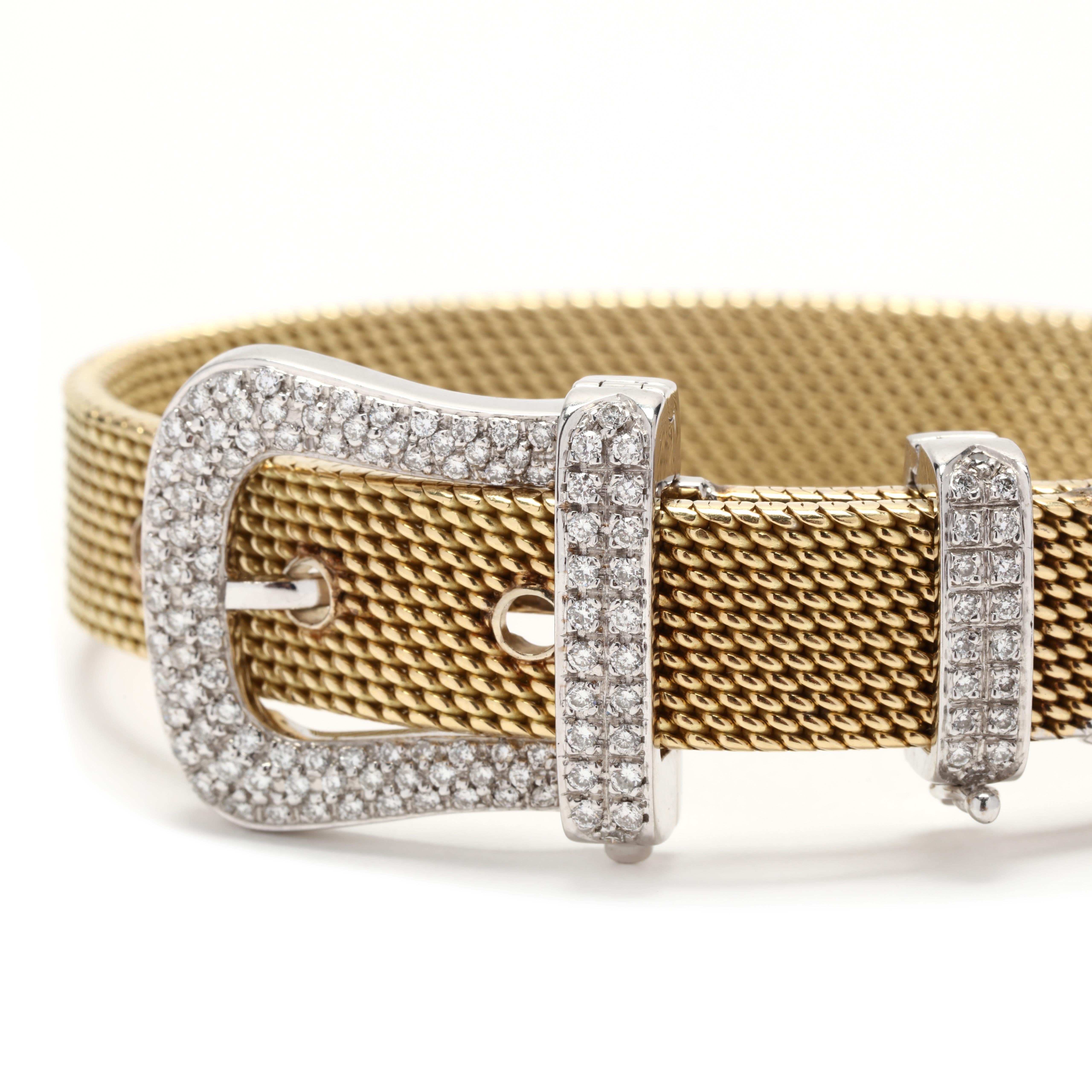 A vintage 18 karat yellow and white gold diamond mesh buckle bracelet. This classic buckle bracelet features a yellow gold mesh link bracelet with a white gold buckle clasp set with round brilliant cut diamonds weighing approximately .75 total