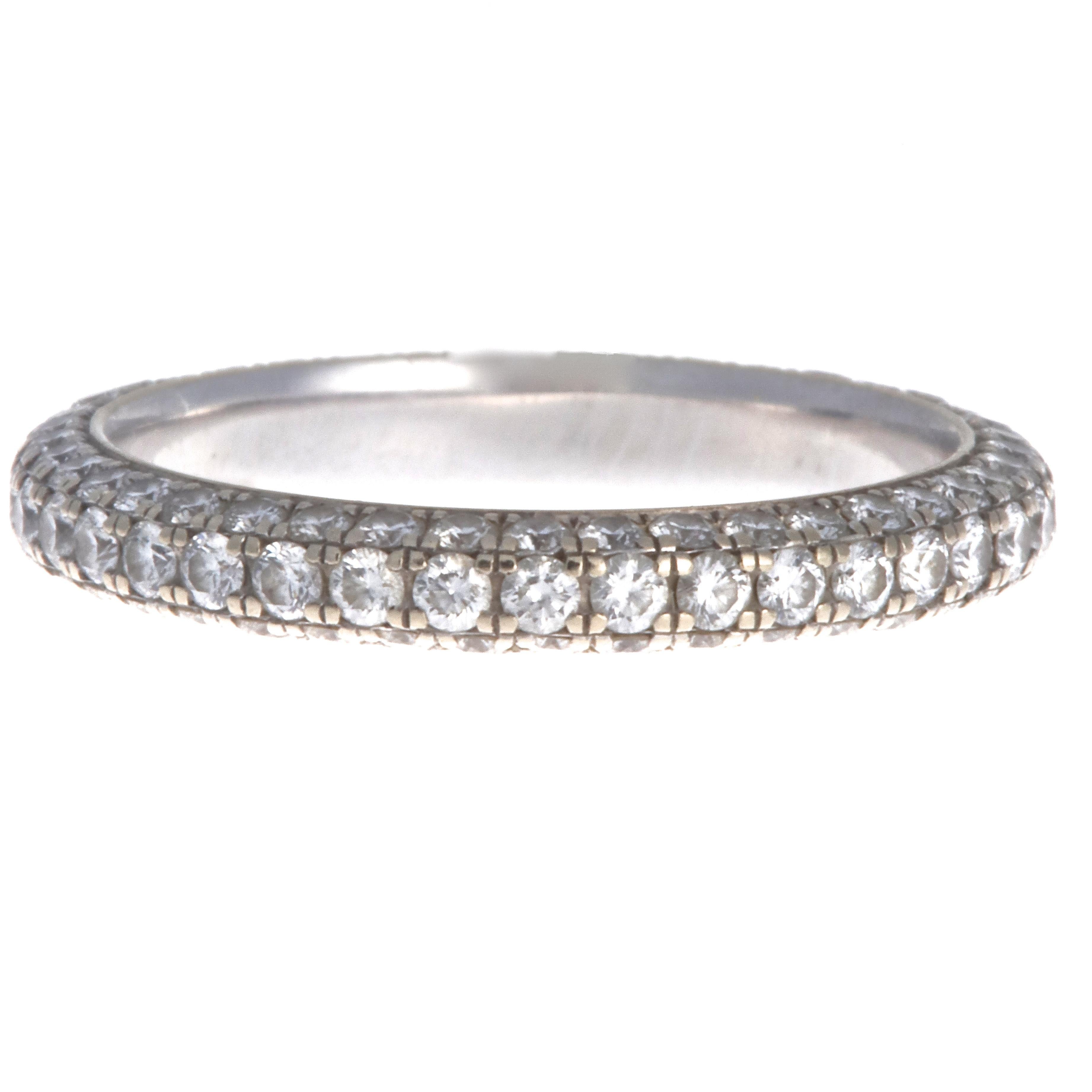 Gorgeous, timeless and classic. Diamonds around the ring as well as on both sides. Featuring 123 diamonds approximately 1.10 carats. A perfect wedding band or an everyday eternity band. This design will never go out of style and all the diamonds