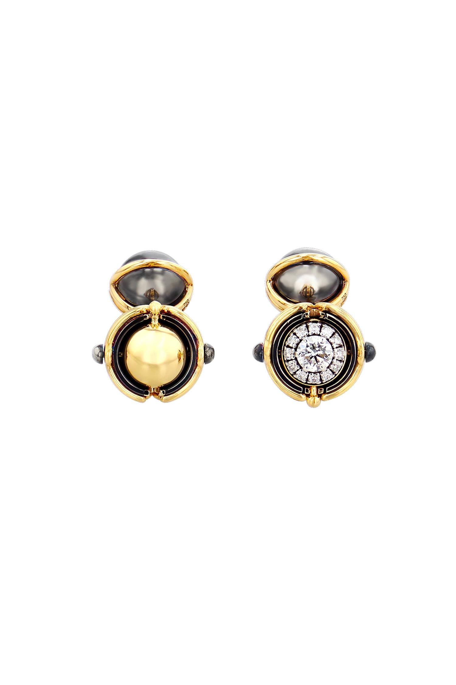 Gold and distressed silver cufflinks. Rotating spheres revealing a central diamond surrounded by diamonds.

Details: 
2 Central Diamonds: 0.46 cts, ø 4mm
24 Diamonds: 0.31 cts
18k Yellow Gold: 7.5 g
Distressed Silver: 5 g
Made in France
