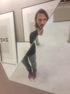 Diamond mirror with faceted reflections at different angles