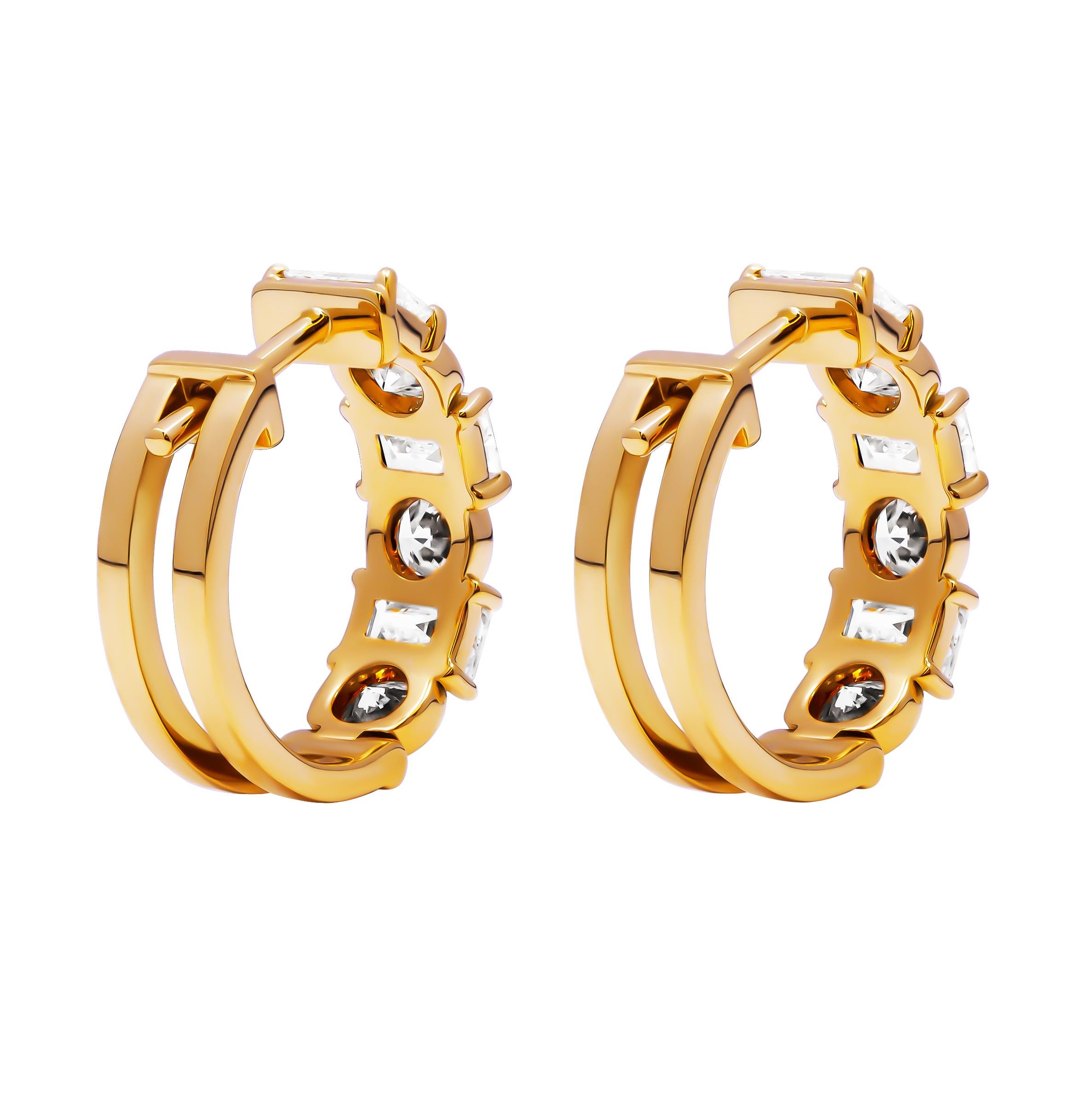 Elevate your jewelry collection with these exquisite hoop earrings, masterfully crafted in 18k yellow gold. These luxurious earrings feature an alternating arrangement of emerald-cut and round diamonds, creating a captivating blend of shapes and