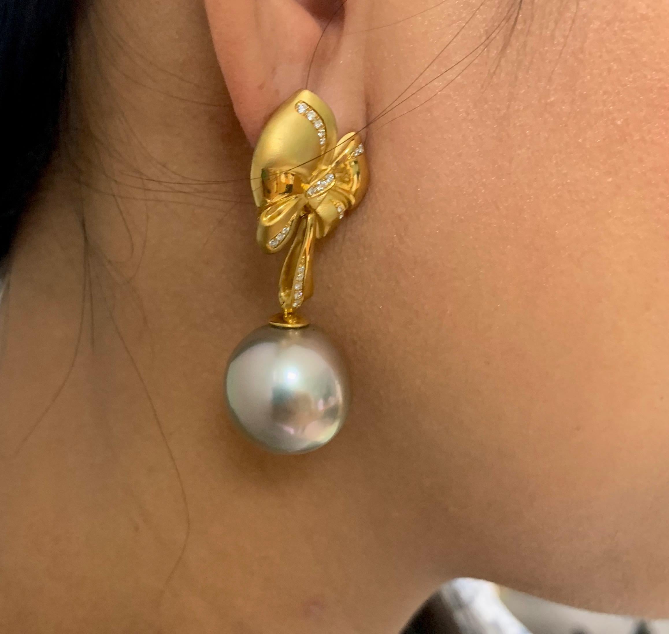 gold bow pearl earrings