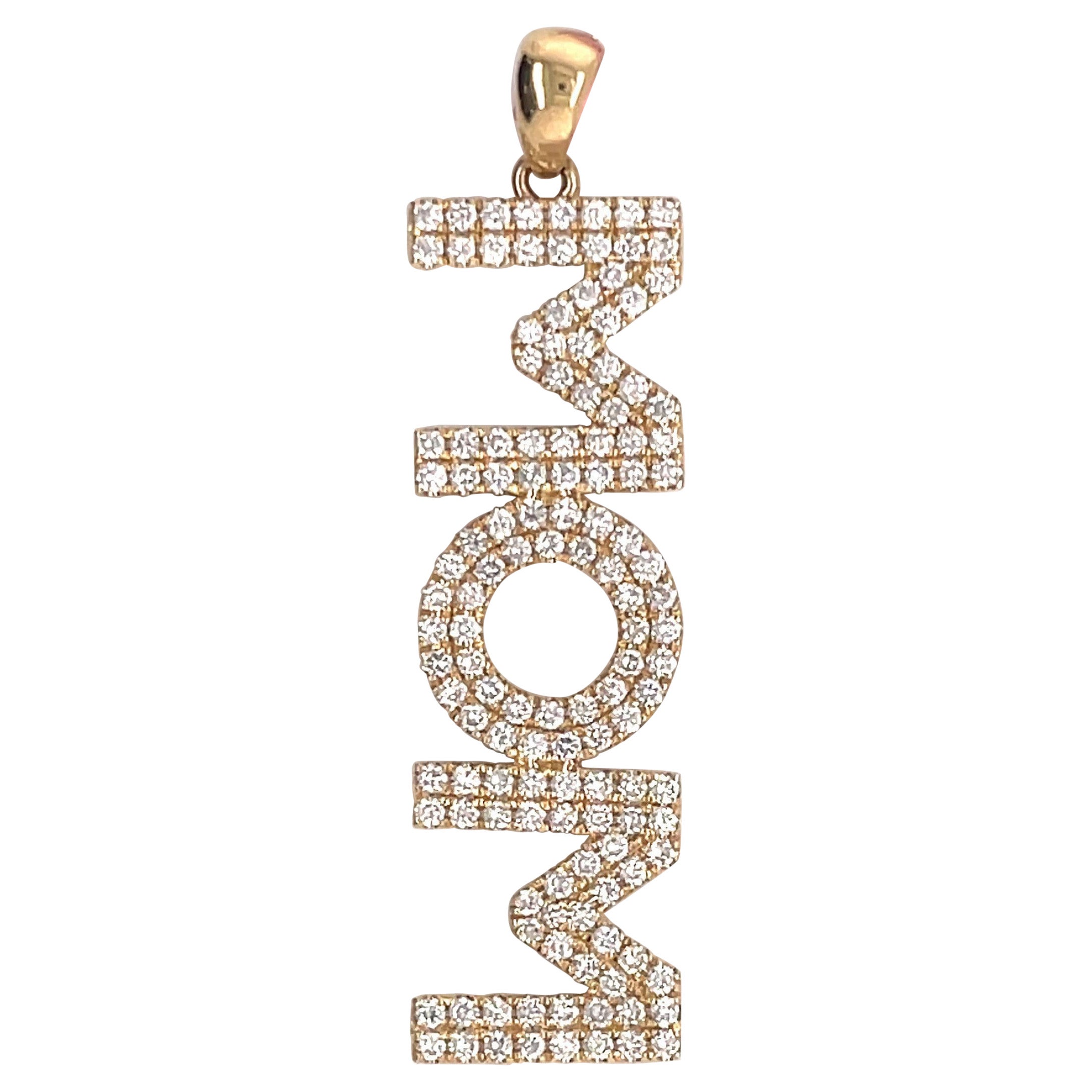 14 Karat Yellow Gold boxed font pendant spelling the word 'MOM' and containing 134 round brilliants weighing 0.95 carats.
Color G-H 
Clarity SI

Chain & Gold Link Enhancer not include. 
More Word Pendants Available. 
Message for pictures & pricing. 