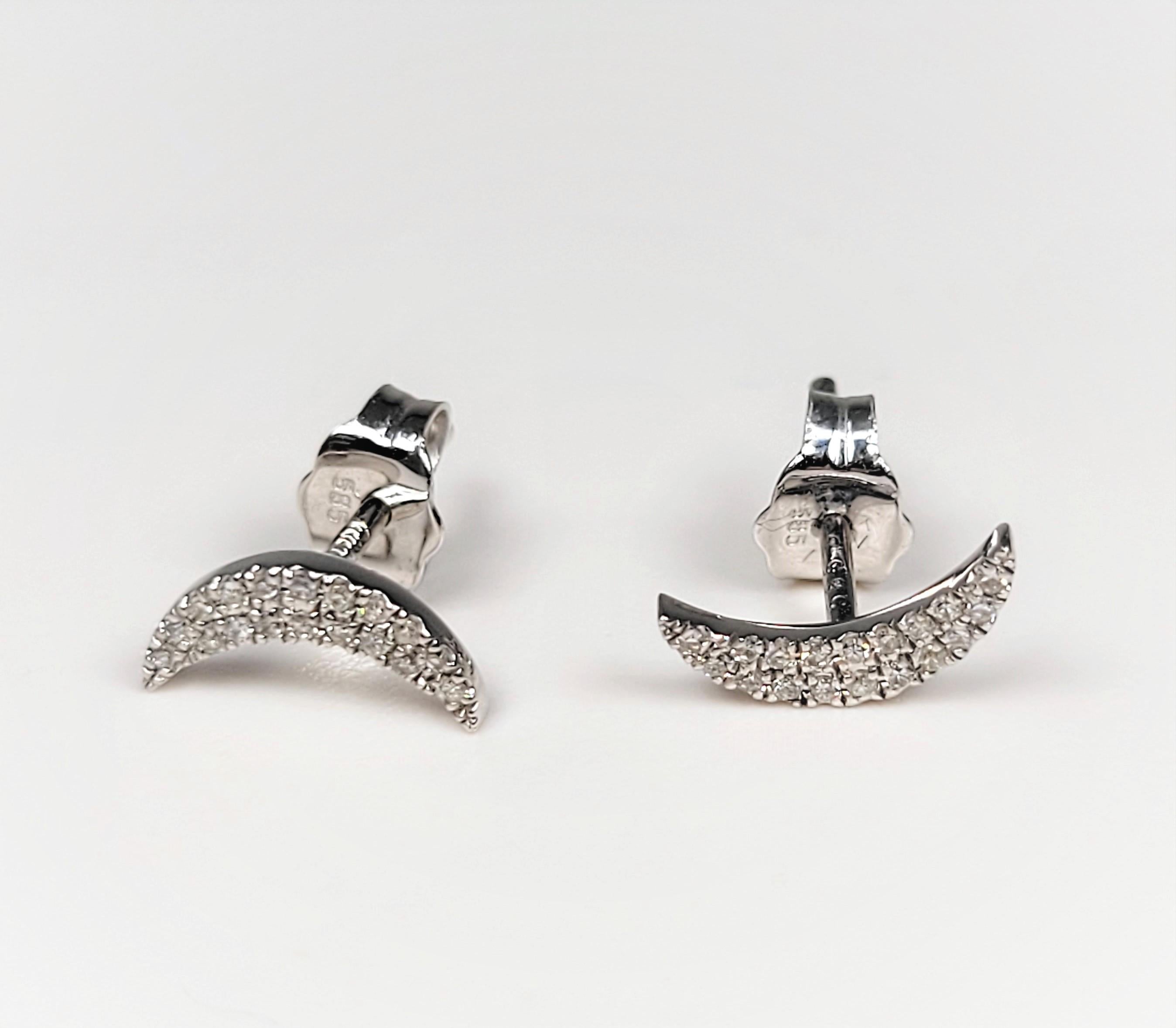 These sweet white gold and diamond earrings are light on the ear!  