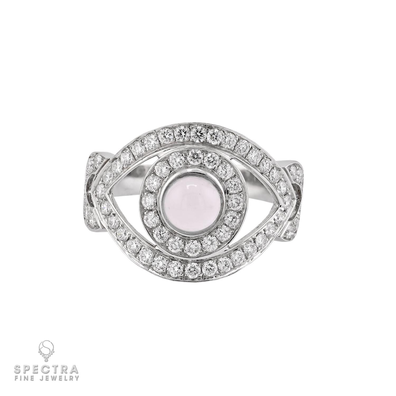 A modern talisman of style and protection, this diamond and moonstone ‘Against-Evil-Eye’ cocktail ring brings together luminous beauty and symbolic meaning. At its center rests a glowing round cabochon moonstone, prized for its ethereal sheen that