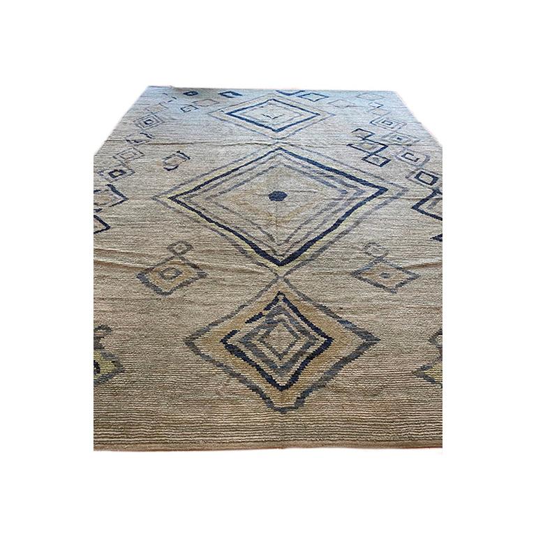 Beautiful Moroccan with unusual diamond pattern.

14’3″ x 10’6″

 

16118

 

The early adoption of rug-making by native Moroccans is certainly due in large part to the distinctive climate of the region: Moroccan rugs may be very thick with a heavy
