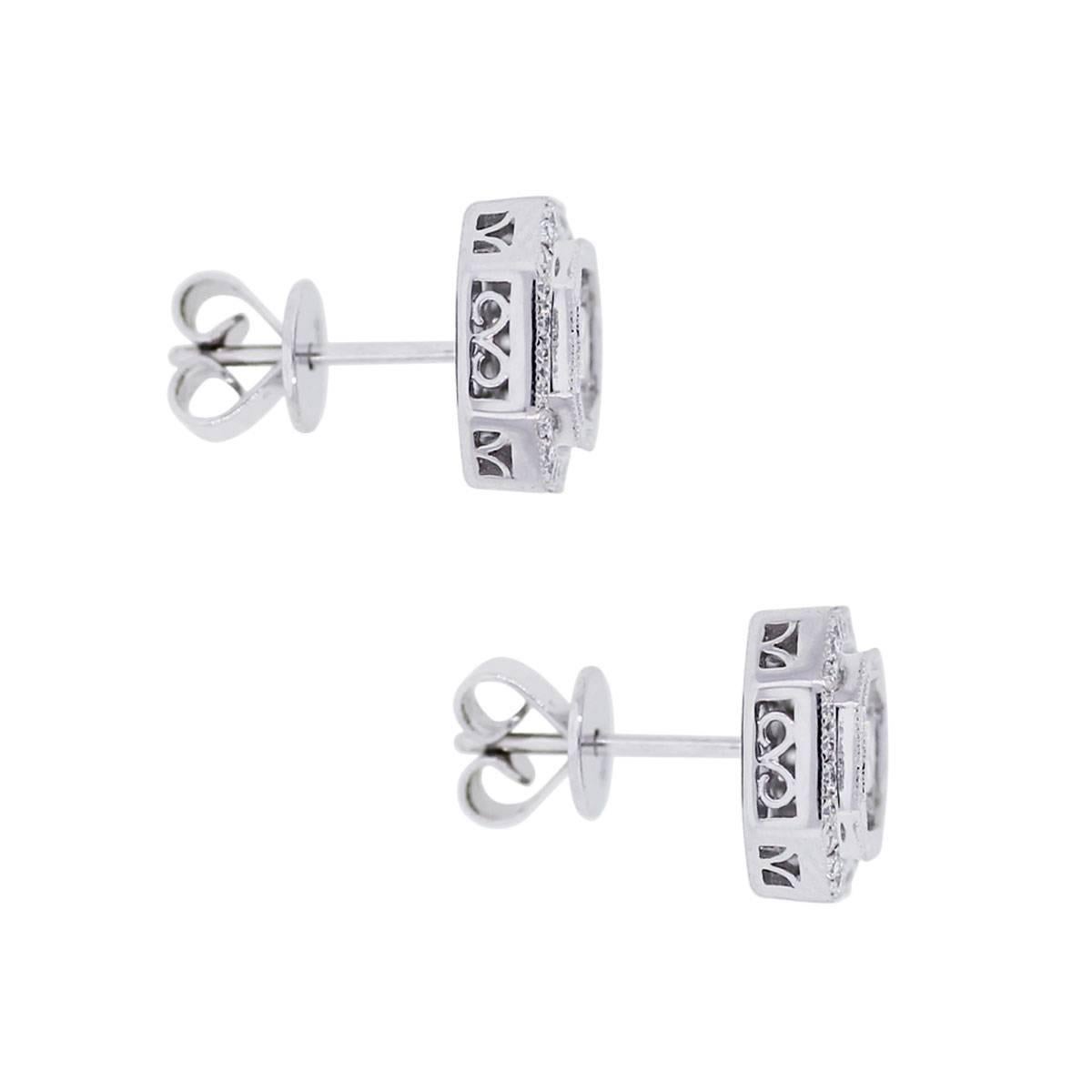 Material: 18k white gold
Diamond Details: Approximately 0.28ctw of princess cut diamonds, 0.24ctw of round brilliant diamonds and 0.35ctw of baguette shape diamonds. Diamonds are F/G in color and SI in clarity
Earring Measurements: 0.40″ x 0.17″ x