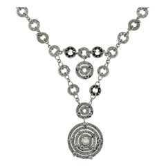 Collana in oro con diamanti a più cerchi