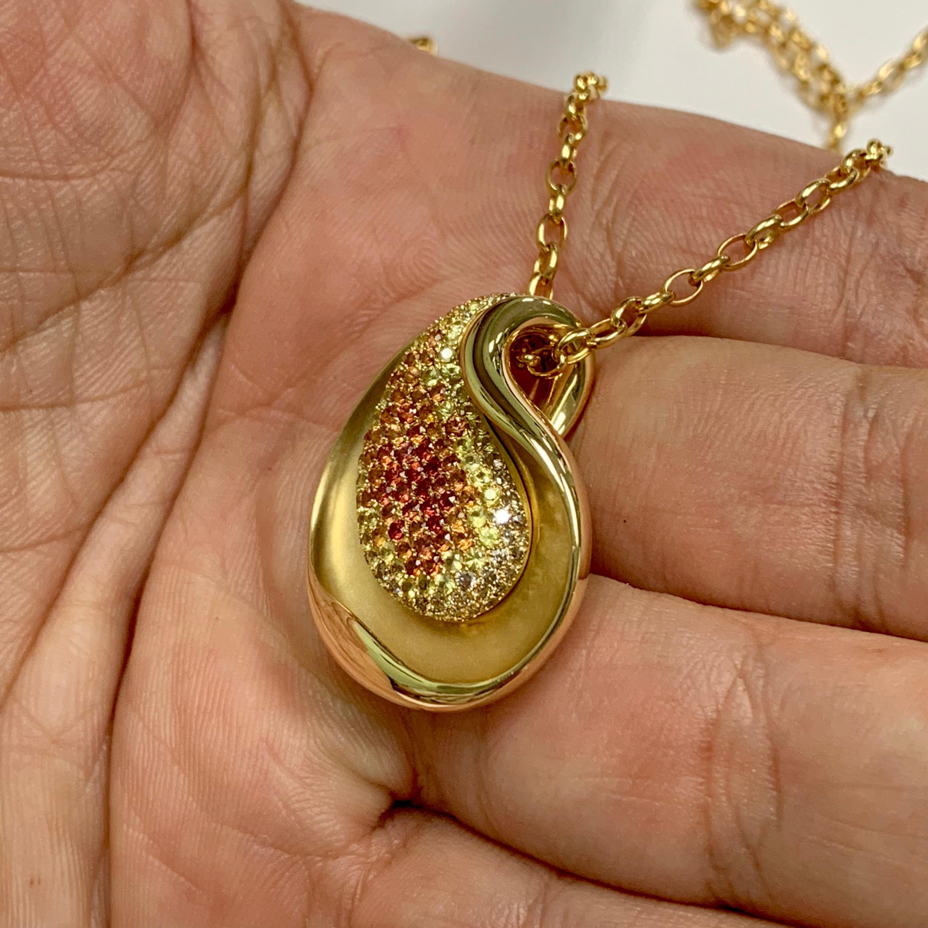 hen with sapphire pendant