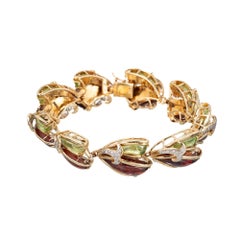 Bracelet en or incrusté de diamants et d'émail multicolore avec incrustation