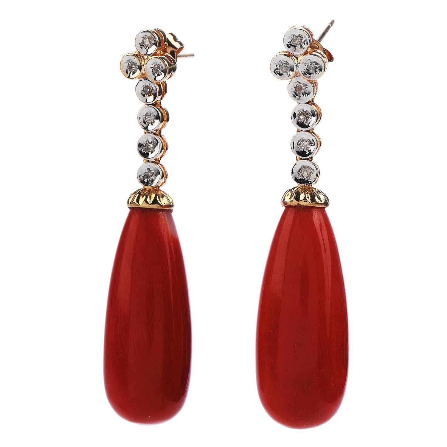 These Vintage Natural Coral & Diamond Drop Dangle Earrings

are crafted in Solid 14K Yellow Gold, with some White Gold Accents.

These 1960s earrings incorporate 2 natural corals of charming red orange color, pear drop shape with natural inclusions,