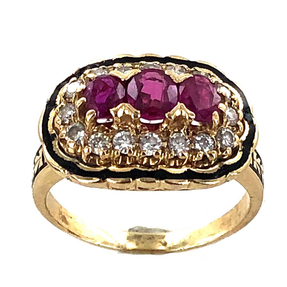 Three beautiful oval cut ruby gemstones are the center of this 1950's ring. The natural rubies are surrounded by 16 round brilliant cut diamonds (.50 carat total weight), and black enamel. The top measures 12 x 18.5mm, and the ring is currently size
