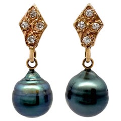 Orecchini a perno con diamante Navette e gocce di Tahiti barocca da 8 mm in oro giallo