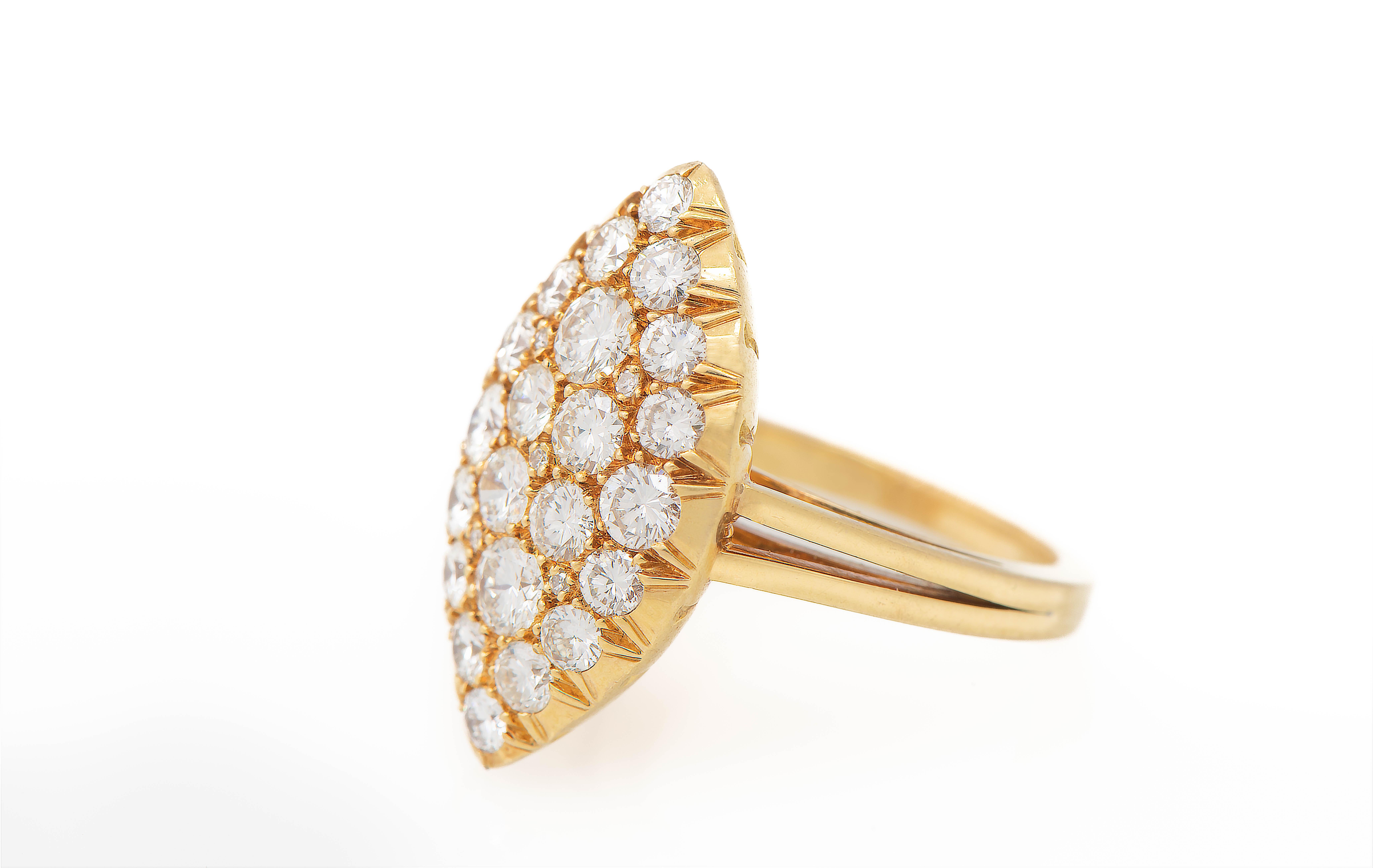 Diamond Navette Ring

27 round cut diamonds set in 18k yellow gold.

Total approximate diamond weight: 2.5 ct

Ring Size: 5.75
Resizable free of charge