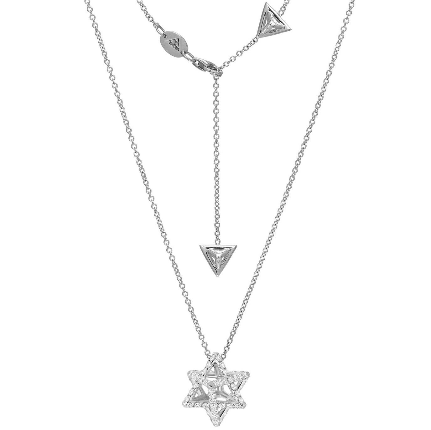 Merkaba star tetrahedron platinum diamond pendant necklace, featuring a total of approximately 1.12 carats of round brilliant diamonds, F-G color and VVS2-VS1 clarity. This heirloom-quality pendant suspends elegantly at the chest, measuring 0.68”, a