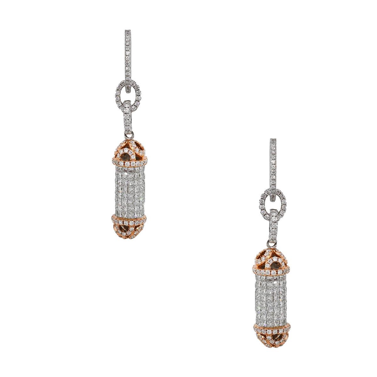 Material: 18k White Gold and 18k Rose Gold
Diamond Details: Approximately 17ctw of round brilliant diamonds. Diamonds are G/H in color and VS in clarity.
Earrings Measurements: 2″ x 0.56″ x 0.35″  13.5g (8.7dwt)
Pendant Measurements: 2″ x 0.15″ 