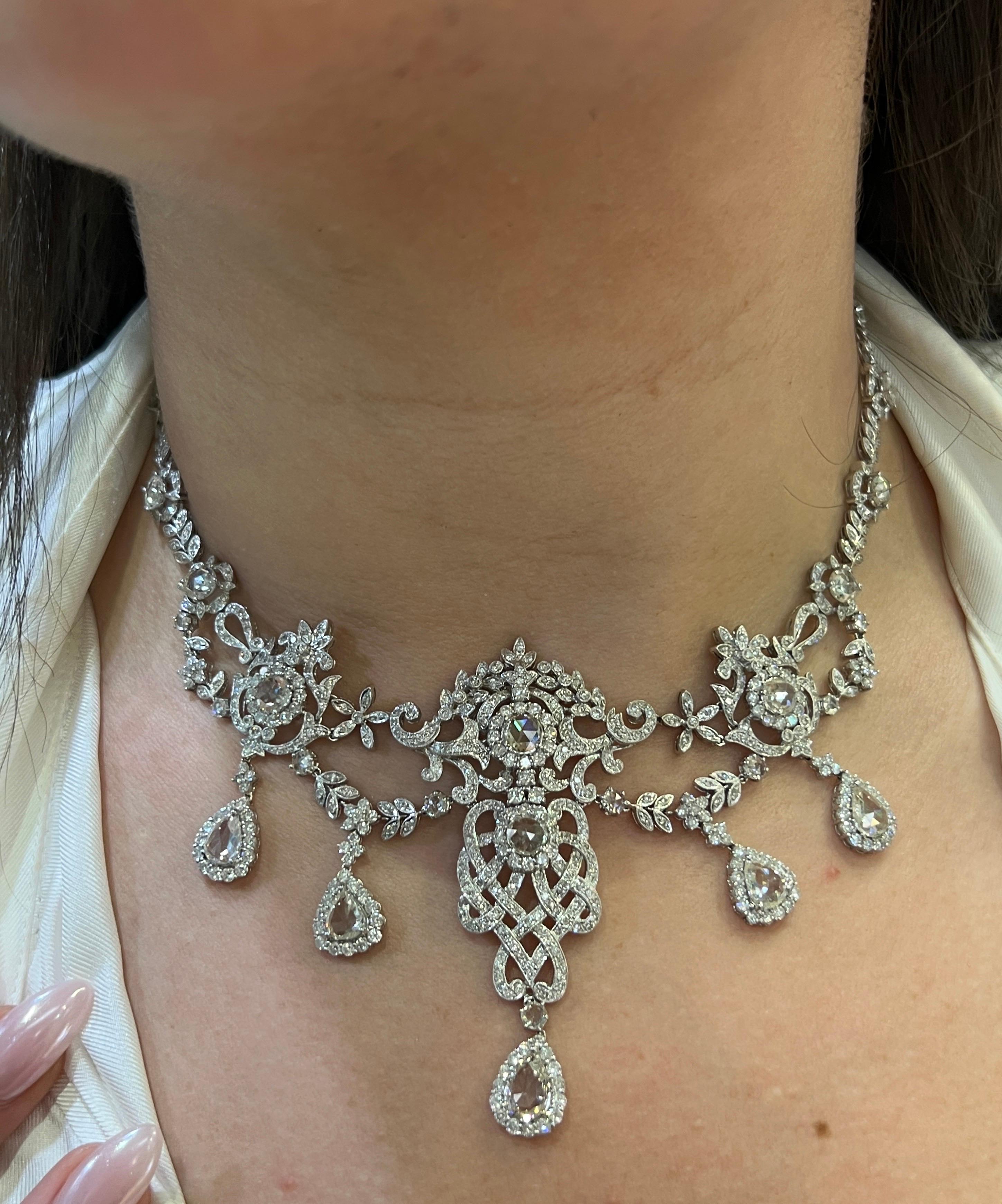 Collana di diamanti 

Collana di diamanti con motivo floreale e rampicante, con diamanti taglio rosa e taglio rotondo incastonati

Lunghezza approssimativa: 15,5 pollici
Tipo di metallo: Oro 18 carati

