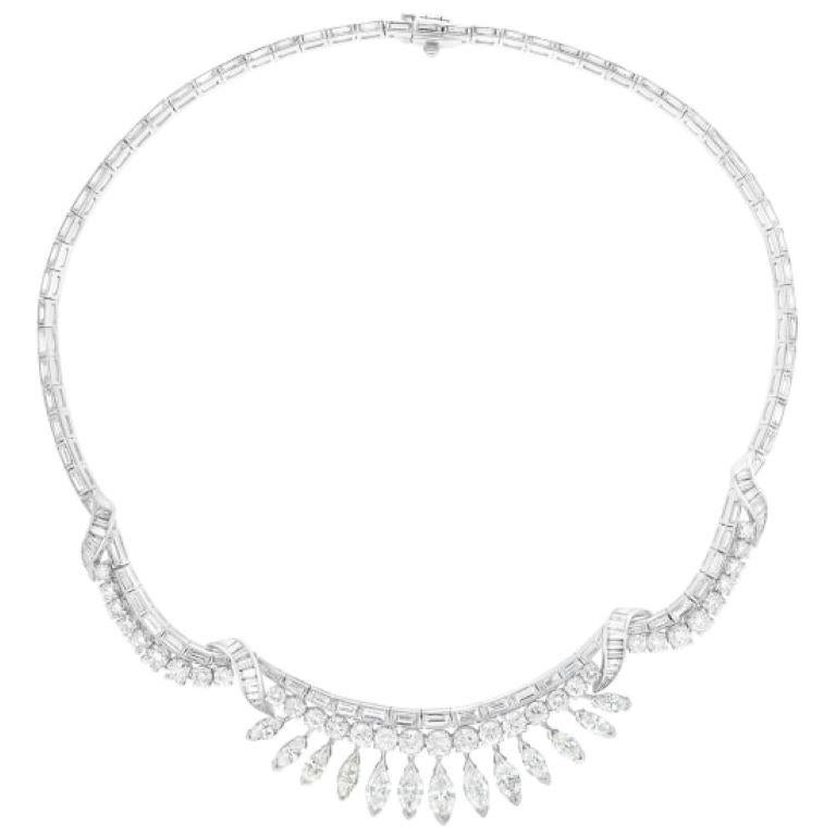 Diamond Necklace, marquise, round & baguette cut diamonds all set in platinum 
13 marquise cut diamonds
24 round cut diamonds
9 step cut diamonds 
Total weight approximately 14 carats
Measurements: 15