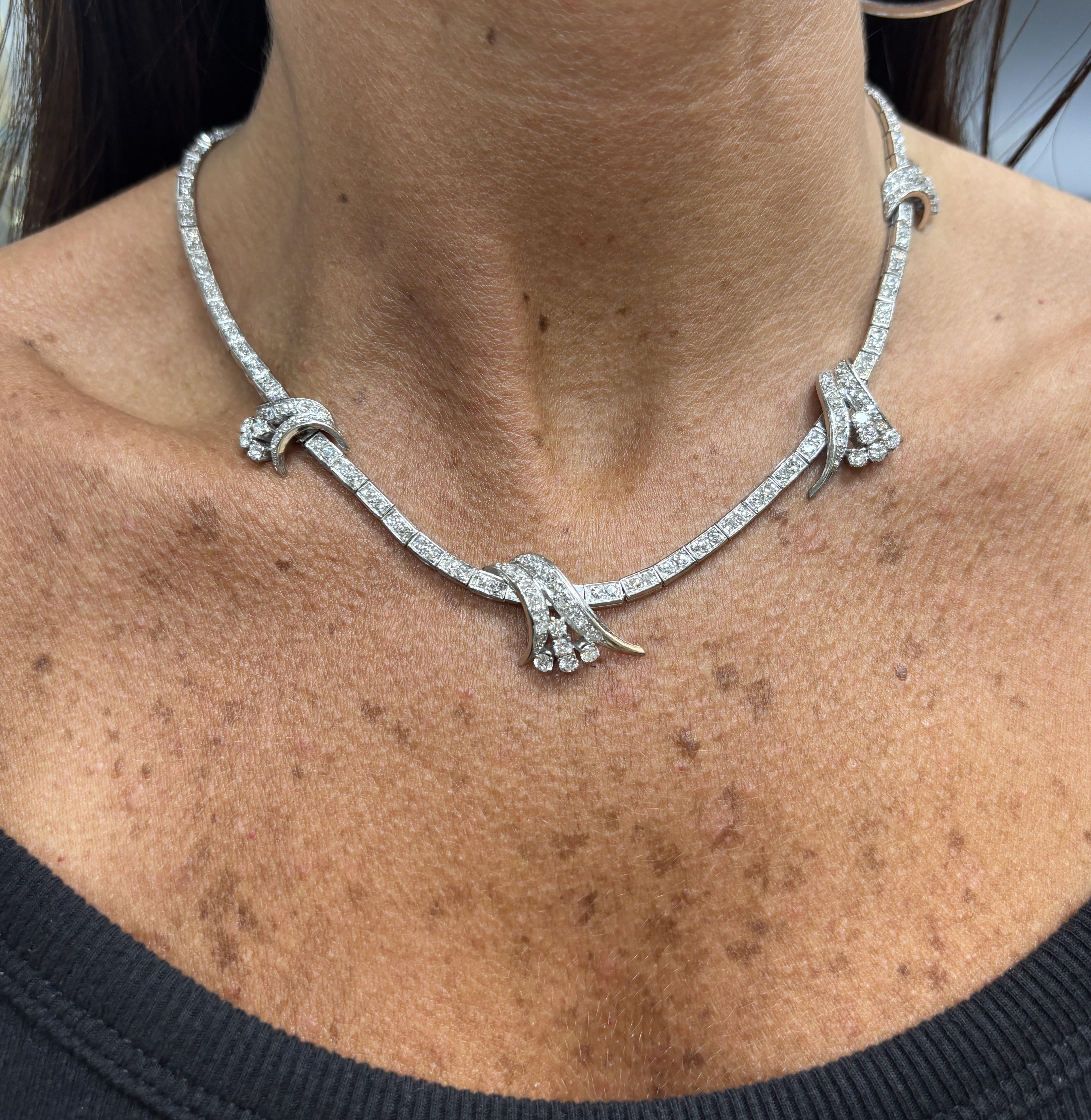 Diamond Necklace

A white gold necklace adorned with round-cut diamonds. 

Approximate Diamond Weight: 13.33 carats
Approximate Length: 16.5 inches 
Metal Type: 18 karat gold 
