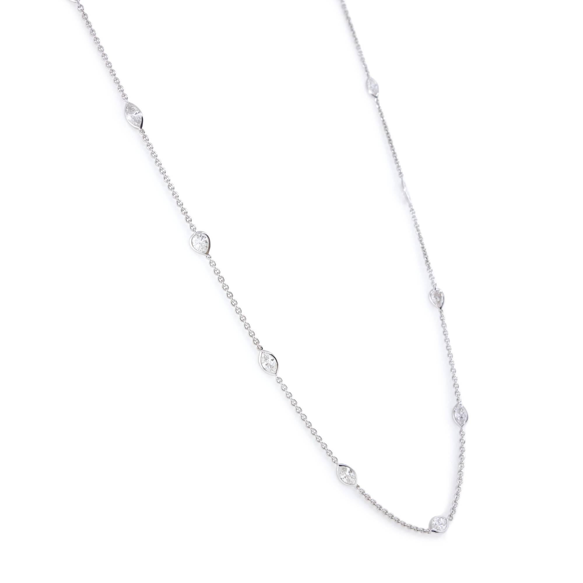 Diamond by the Yard Necklace containing 20 marquise and pear shape Diamonds of about 4.77 carats with a clarity of SI and color G. All stones are set in 18k white gold. The total weight of the necklace is approximately 7.98 grams.

Measurements: (L)