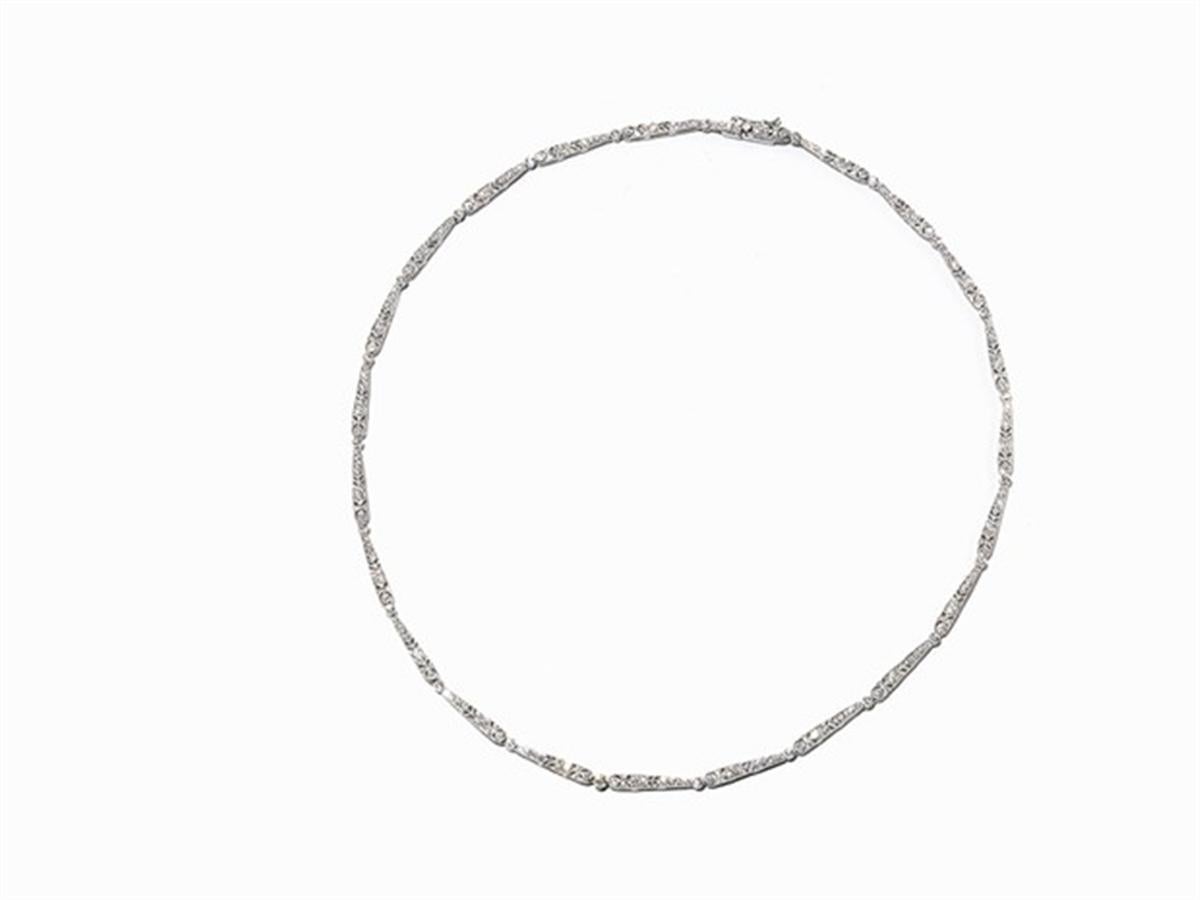  Description of the
- 18 carat white gold
- Punctured with the fineness 