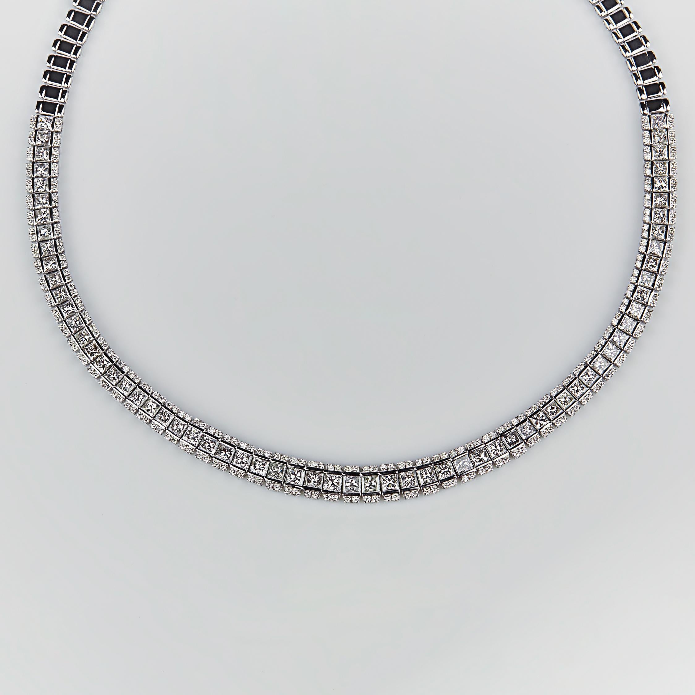 An elegant Diamond Necklace set in 55.08 grams of 18K White Gold and studded using 325 diamonds totally weighing 14.67 carats in SI-GH clarity and color. 18 inches of sheer beauty and royalty crafted and linked by the hands of only the most