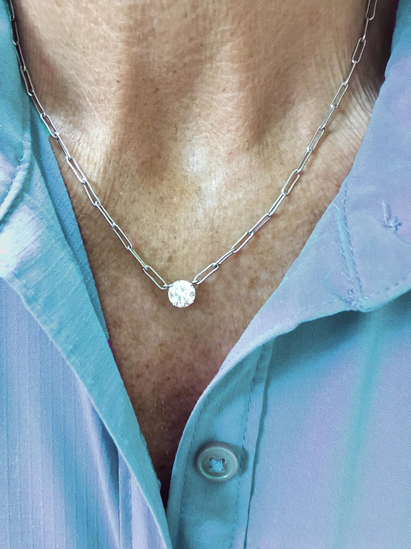 Diamond necklace set with a 1.50 Carat Brilliant-Cut E VVS1. 1