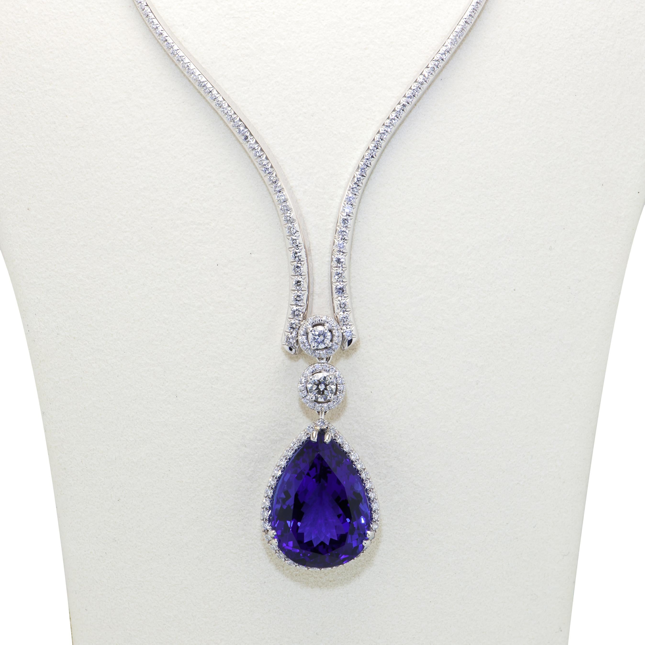 Simply Beautiful Diamond Necklace hand set with 189 Brilliant cut Diamonds, 3.53 tcw and featuring a Spectacular 31 Carat Pear shaped Tanzanite Drop Pendant, measuring 17x24x11mm surrounded by 35 Brilliant cut Diamonds, approx. 0.46tcw. Approx. 25”