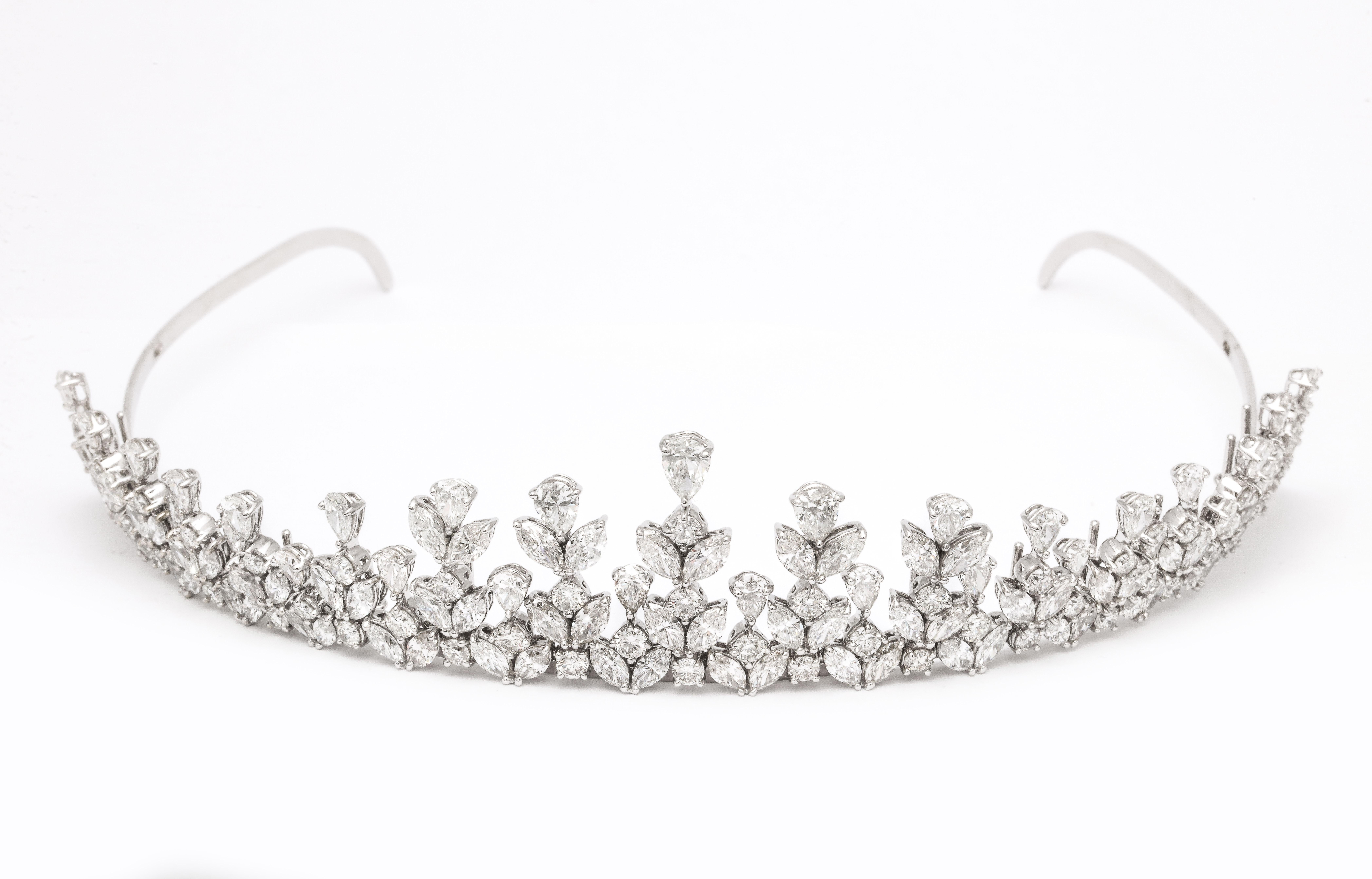 
A MASTERPIECE! 

46.75 carats of white pear, marquise and round brilliant cut diamonds set in 18k white gold. 

The piece can be worn as a necklace and easily converted into a tiara. 

The center of the tiara measures 1.20 inches high. 

The