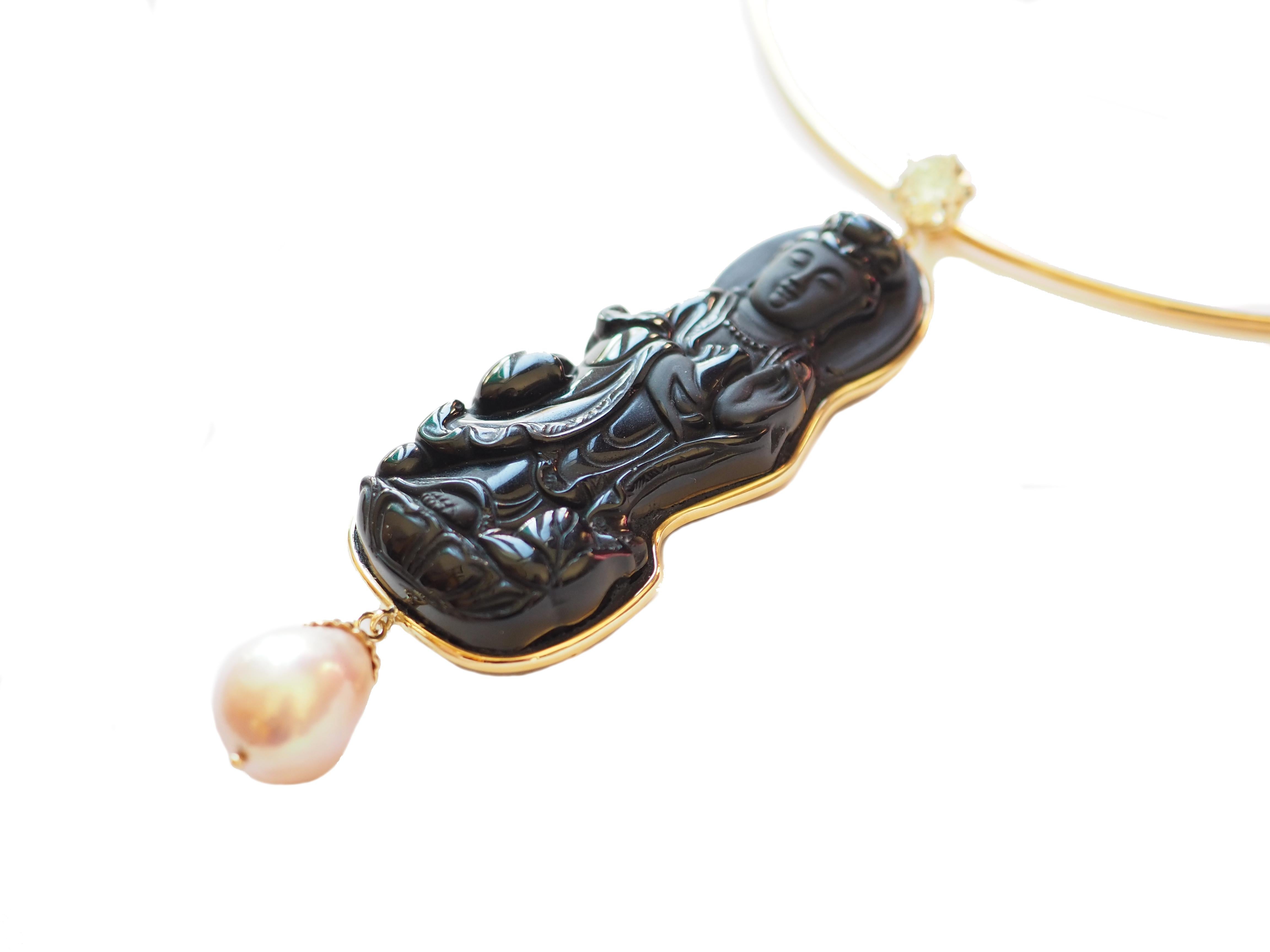 Unique necklace with carved onyx buddha, in one of the meditation  positions. 
Yellow diamond cts 1,40, amazing natural pearl, 18k gold 23gr. 
The pendant could be detach and wear in some other support, so you can use also the necklace. 
All Giulia