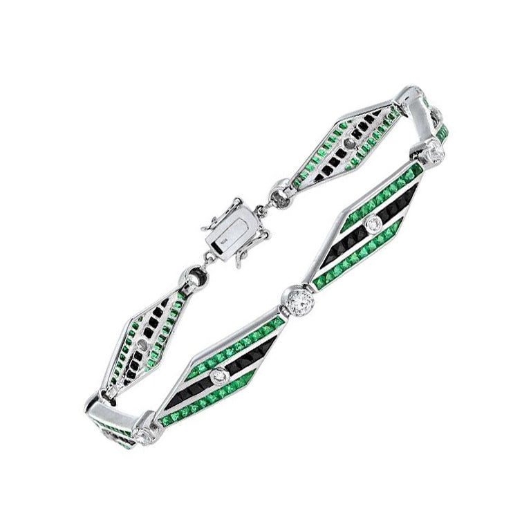Pulsera de eslabones estilo Art Déco de oro blanco de 18 quilates con diamantes, ónices y esmeraldas en venta
