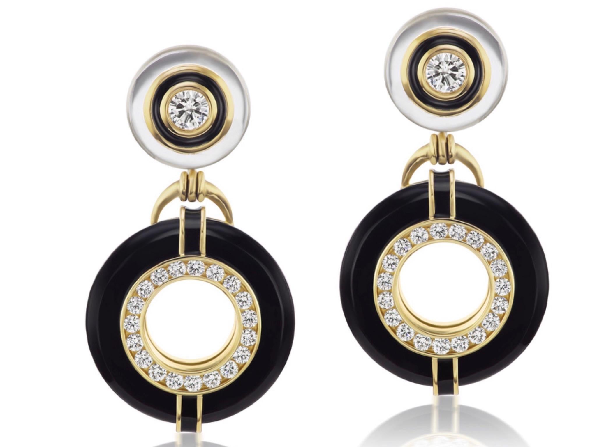Andrew Glassford's Donut Series III earrings have incorporated a modern art-deco look with diamonds and black enamel in 18K Yellow Gold. 7 carats carats of clear Rock Crystal make up the top 12mm disc. The polished rock crystal discs have .44 carats