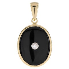Pendentif de style Art déco en or jaune 9 carats avec onyx et diamants de forme ovale