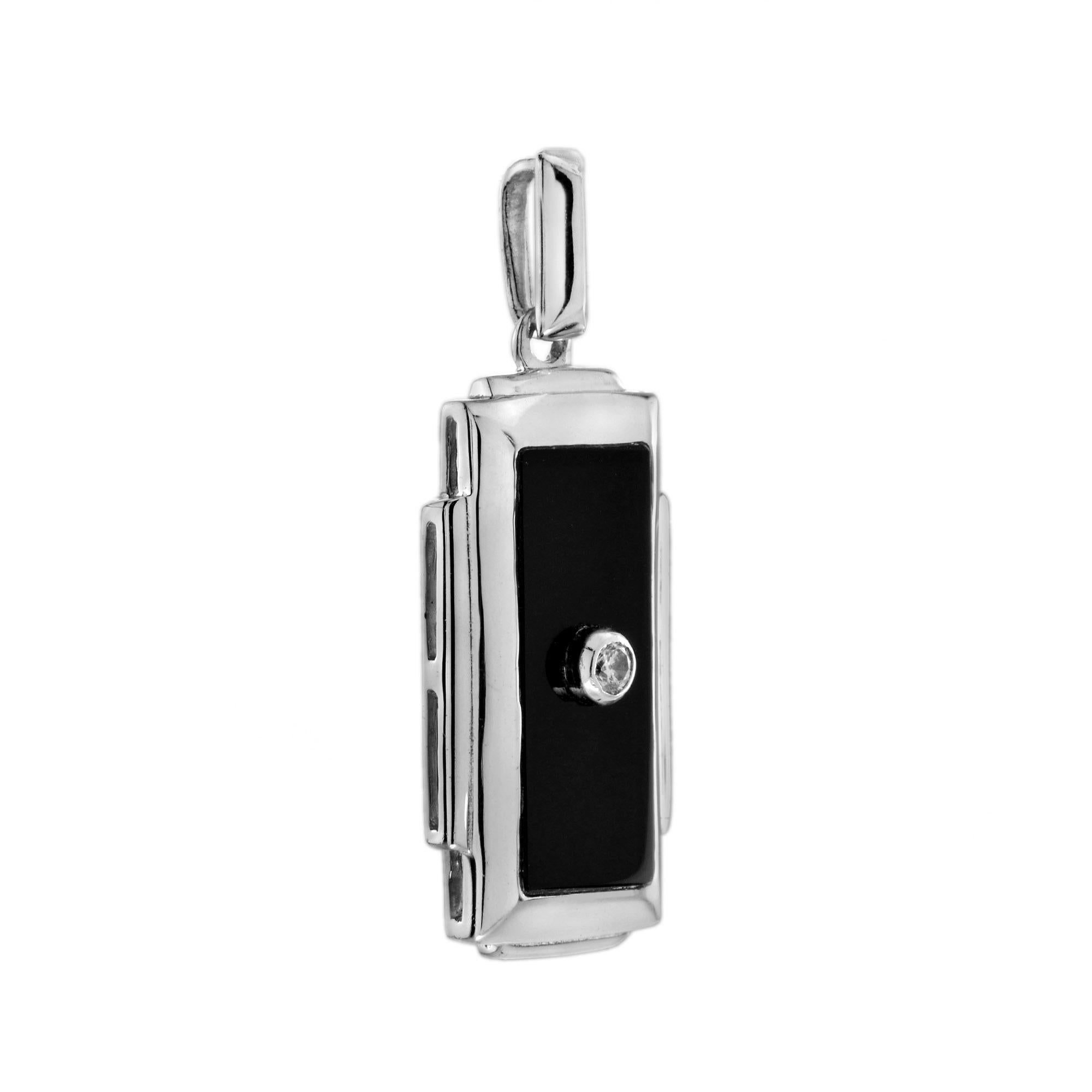 Square shaped onyx, brilliant round diamonds, and 14k white gold combine to create an eye-catching Art Deco-inspired pendant that can be worn by both male and female.

Information
Style: Art Deco
Metal: 14K White Gold
Width:13 mm.
Length: 35