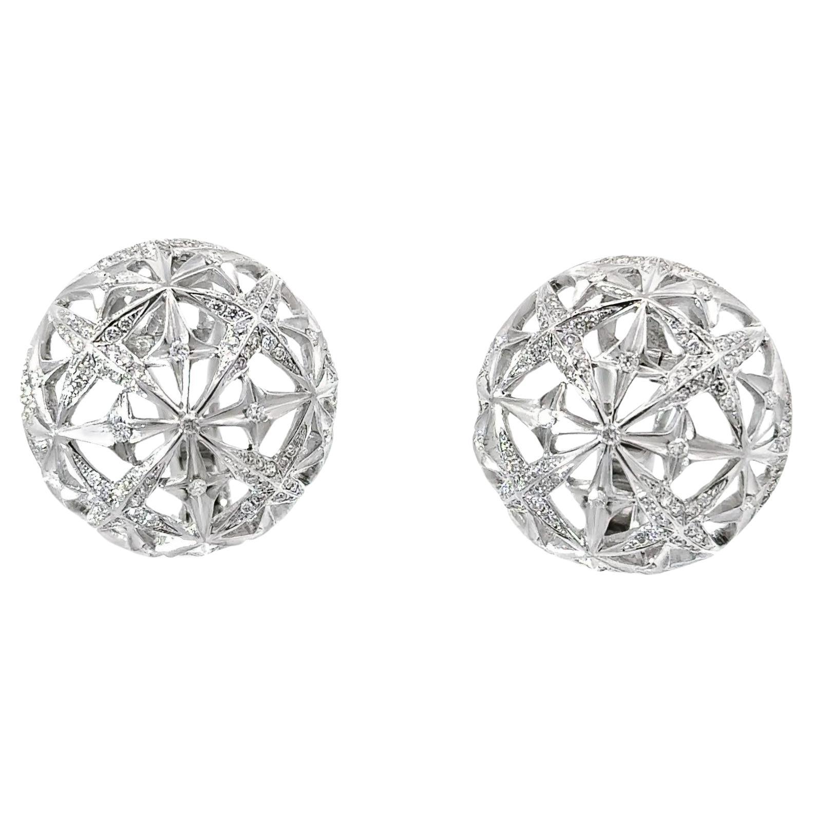 A magnificent dome of 1.67 carats of round brilliant-cut diamonds are set in a three-dimensional shape giving a perfect stellar aspect to the jewel. The silhouette lends a sense of volume and dimension to the earrings, creating a subtle yet striking