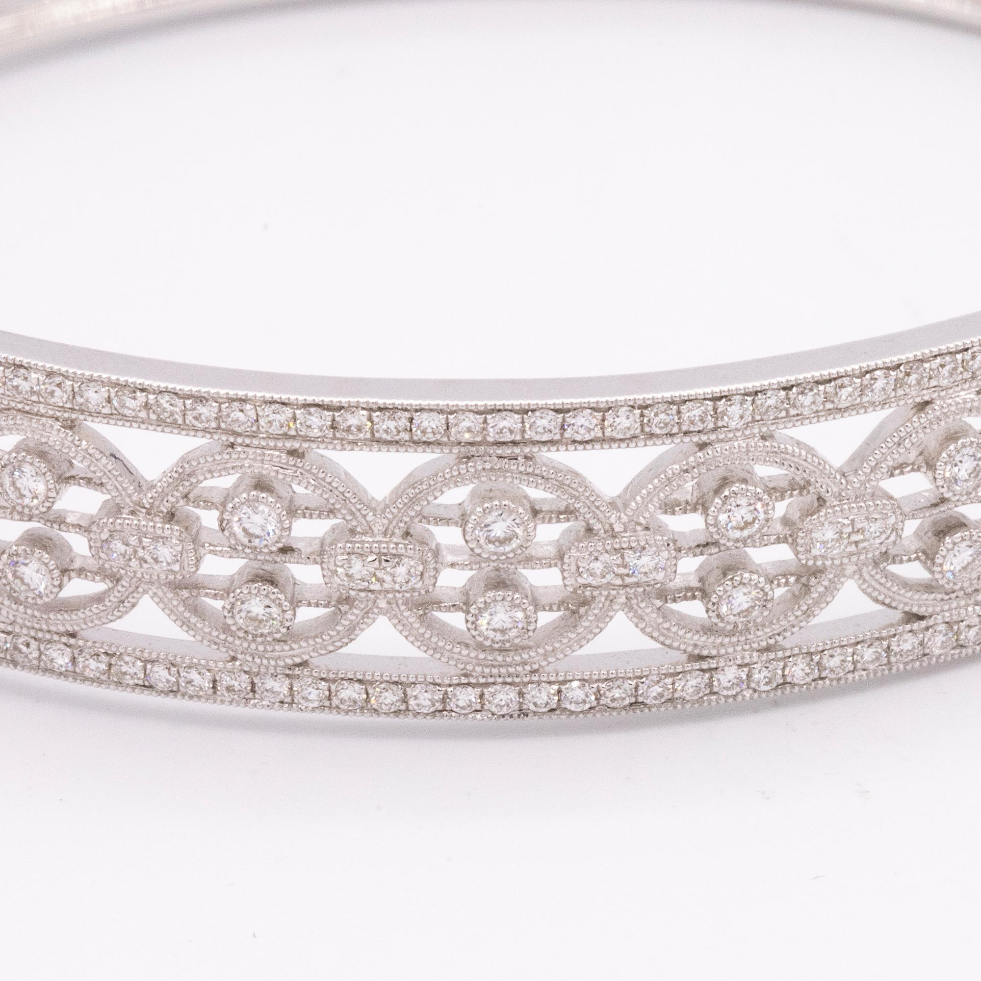 From the Hamilton Jewelers Heritage Collection, this diamond bangle bracelet combines old world details with timeless design. Beautiful filigree work and milgrain edges are in 18k white gold.  Vintage vogue meets modern elegance.

Diamonds:    213
