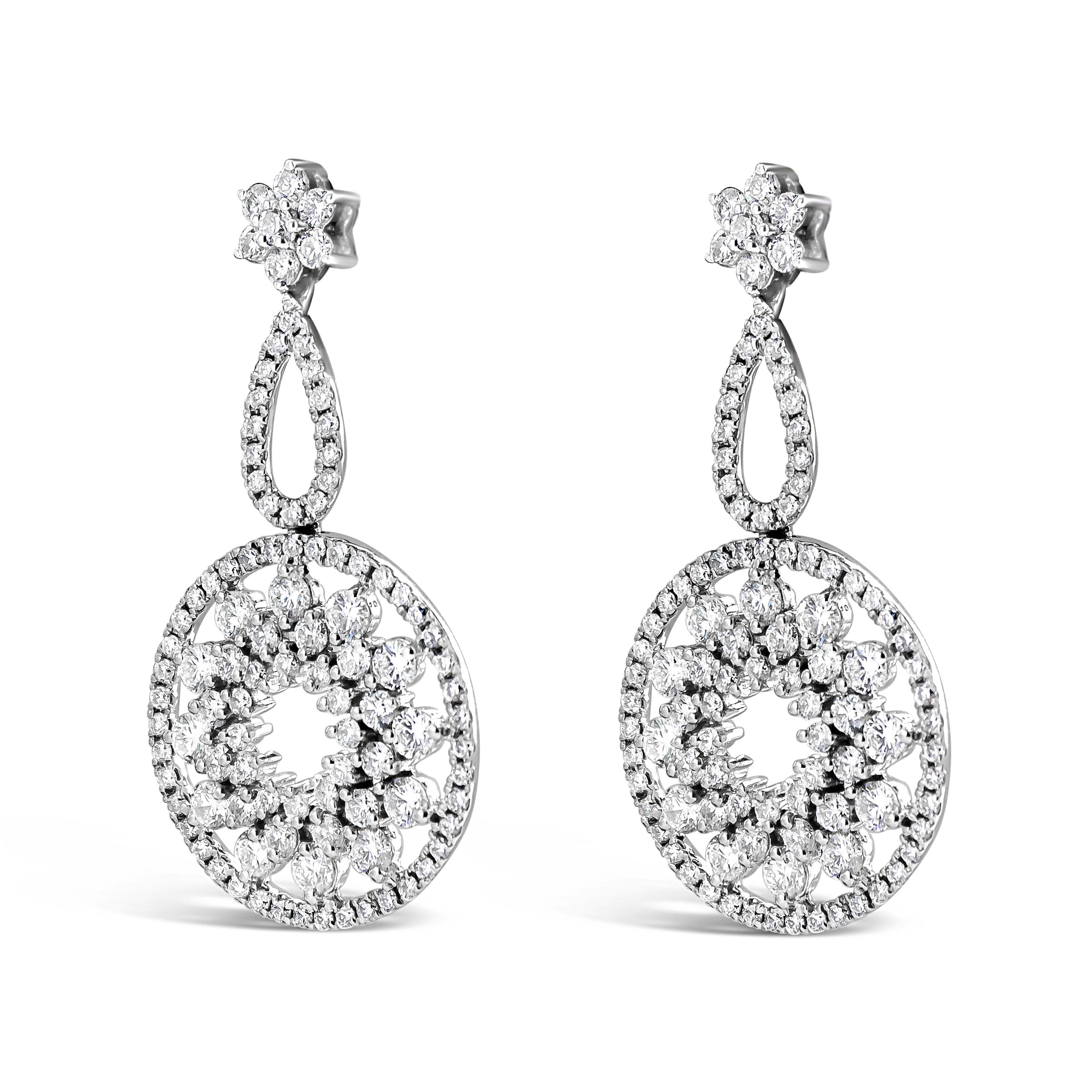 A luxurious pair of chandelier earrings showcasing round brilliant diamonds set in an intricate, open-work arabesque design. Diamonds weigh 2.42 carats total. Made in 18K White Gold

Style available in different price ranges. Prices are based on