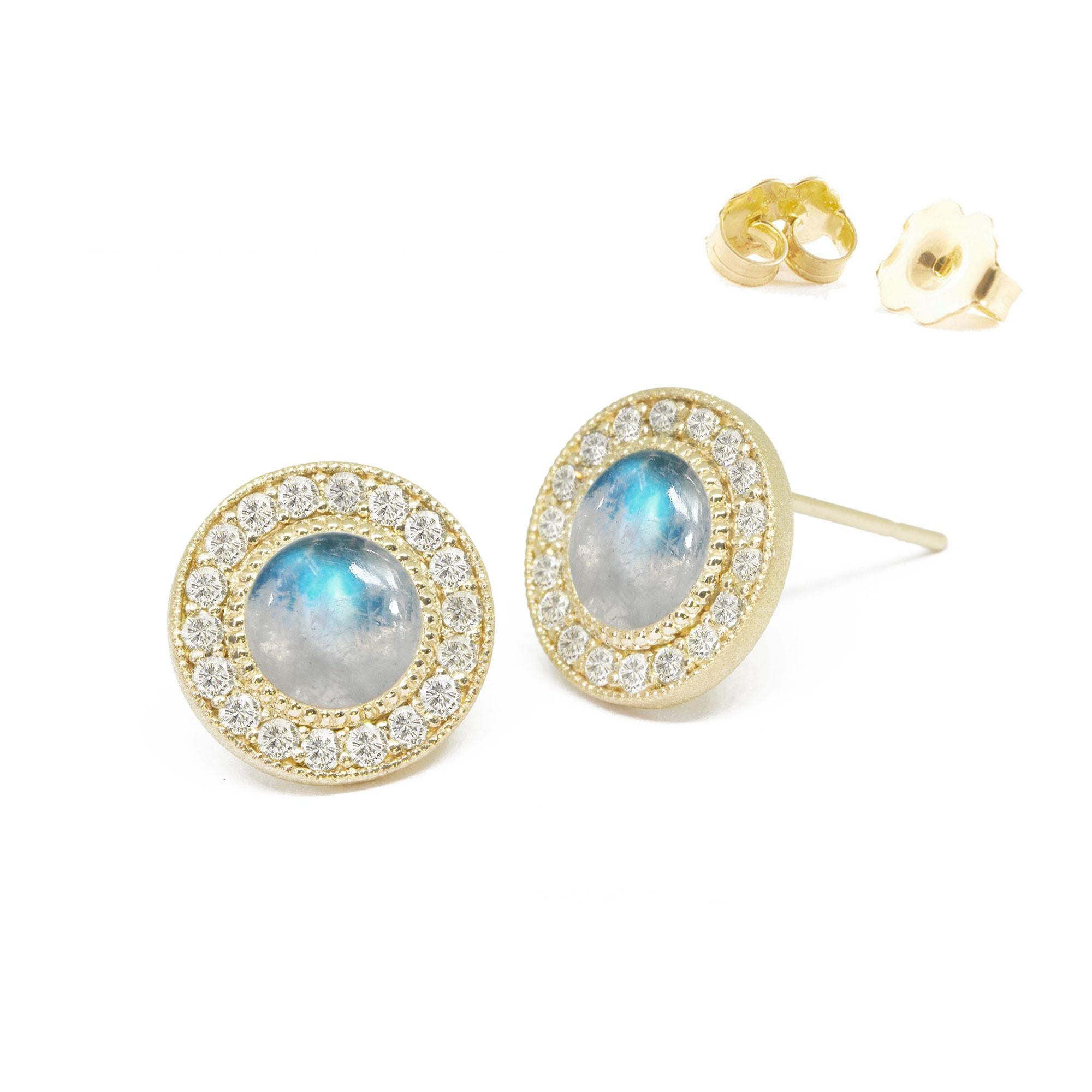 Designed with concentric circles of engraved gold and pavé diamonds surrounding moonstone cabochons, the Diamond Orbit Gold Studs elevate everyday looks with a cool mix of textures and lusters.

Nina Nguyen Design's patent-pending earrings have an