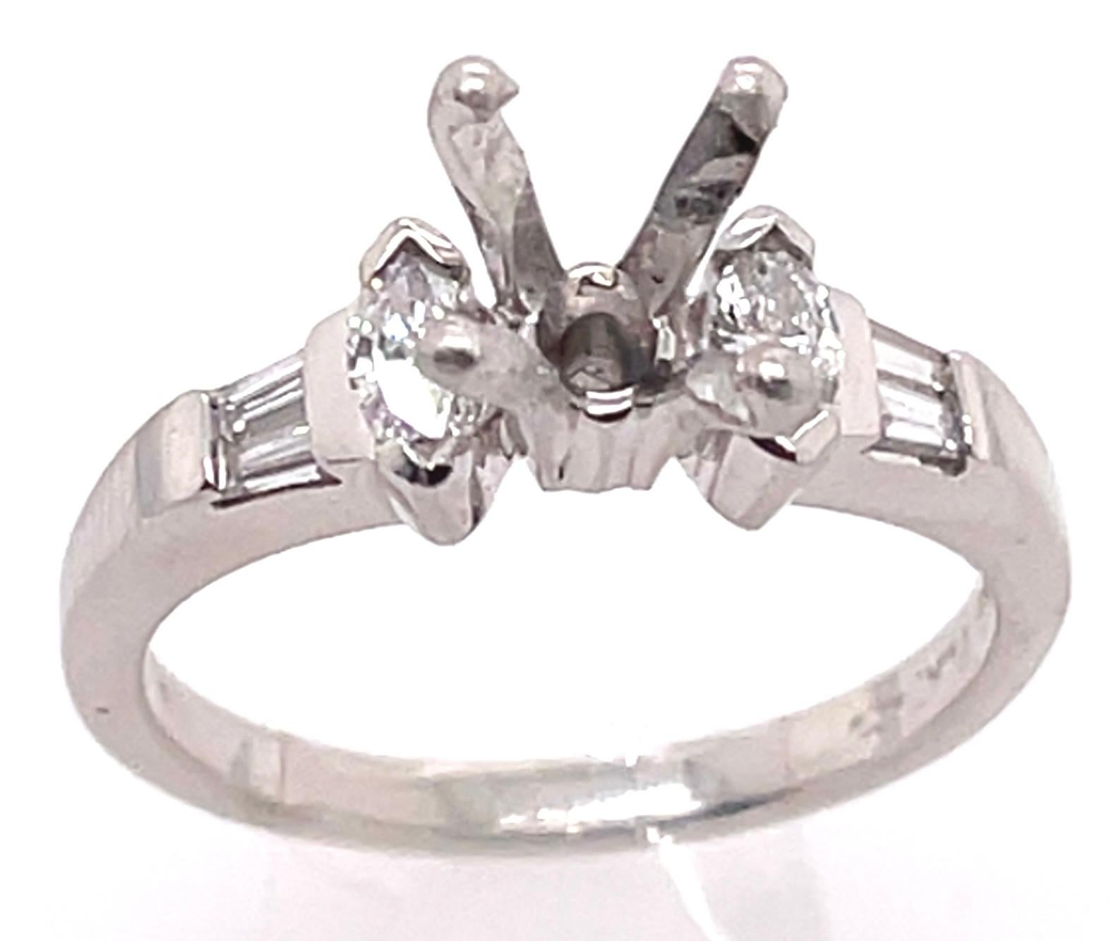 Diamond Oval And Baguette Side Detail Engagement Ring Setting In Platinum
1.00 total diamond weight.
Size 7
7 grams total weight.