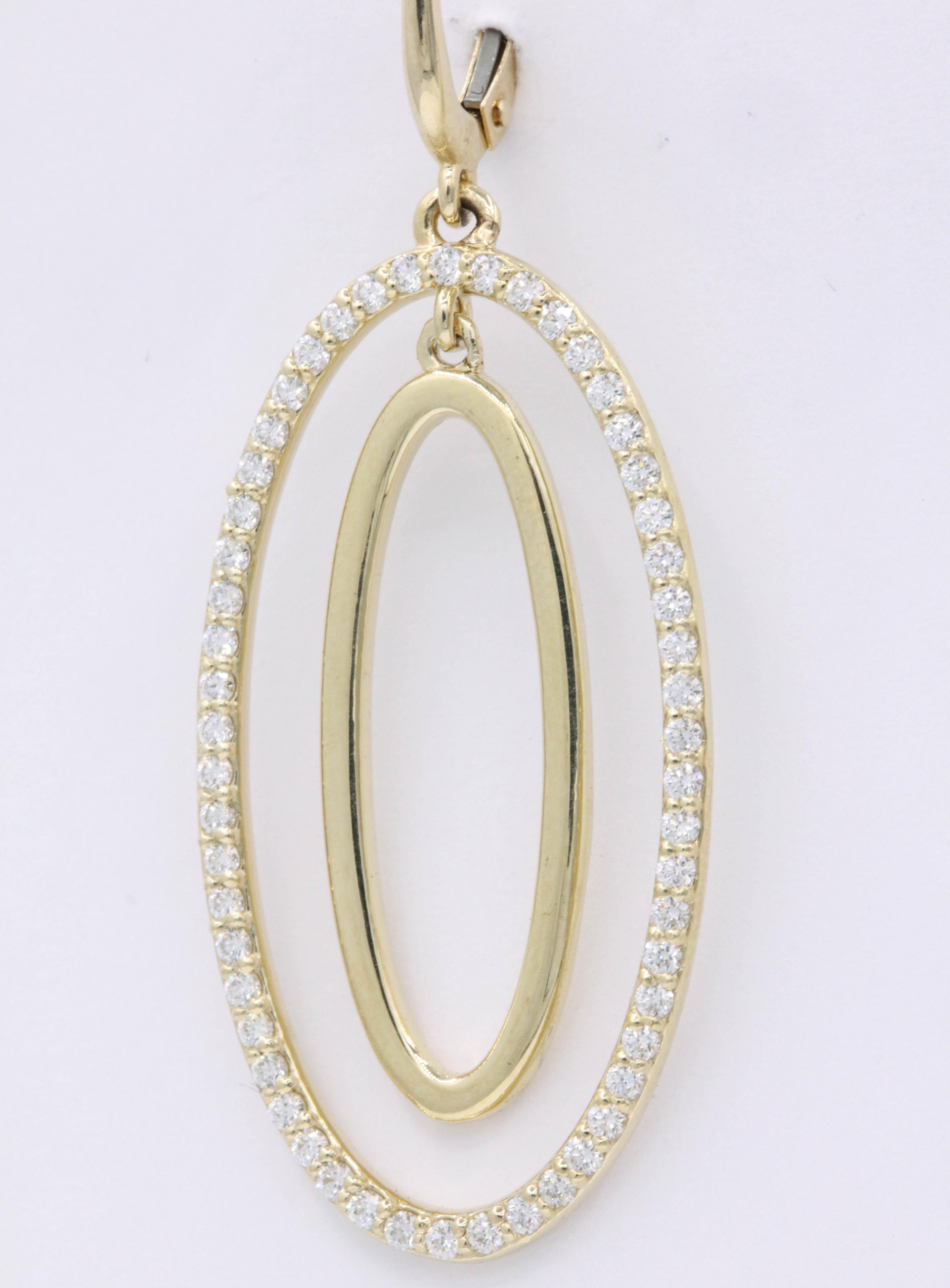 Contemporary Diamond Oval Hoop Earrings, 1.10 Carat For Sale