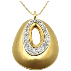 Diamond Oval Pendant Necklace 14 Karat Yellow Gold