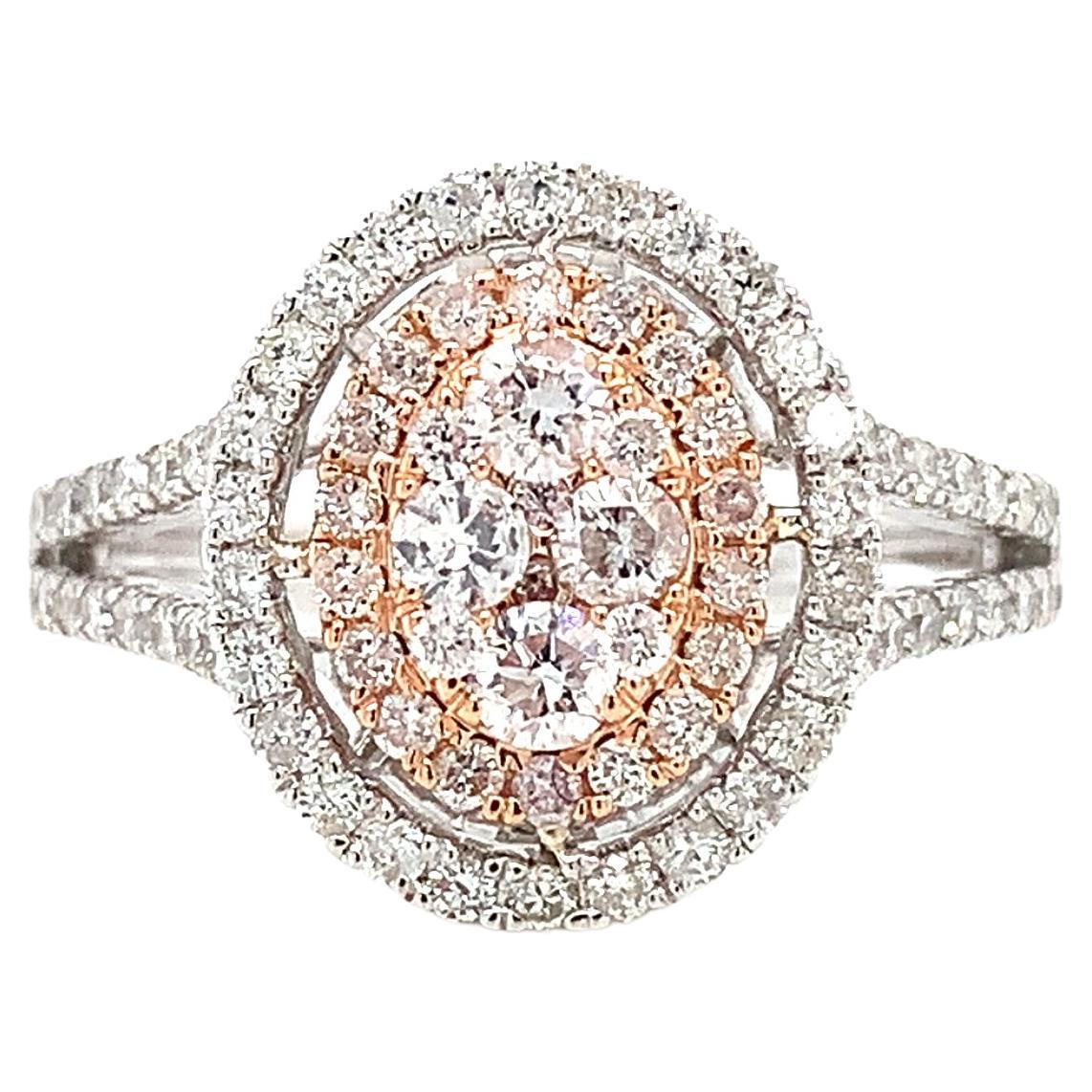 Diamond oval shaped halo engagement ring 18k white and rose gold