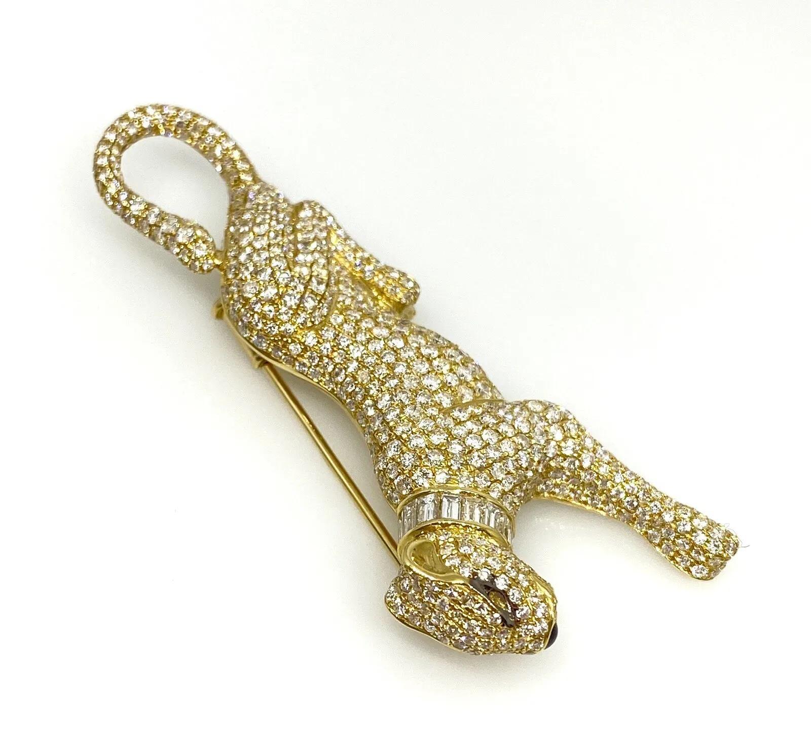 Diamond Panther Brooch with Baguette Collar 4.26 Carat Total Weight in 18k Yellow Gold

Diamond Panther Pin features reclining Panther pavè set with Round Brilliant Diamonds over the entire body, with a Brown Diamond Eye and a Baguette Diamond