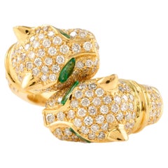 Bague bypass panthère à double tête en or jaune massif 18 carats avec diamants emblématiques