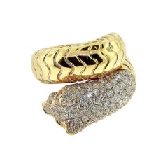 Anillo Envolvente Pantera de Diamantes con Ojos de Rubí y Ónix Oro Amarillo