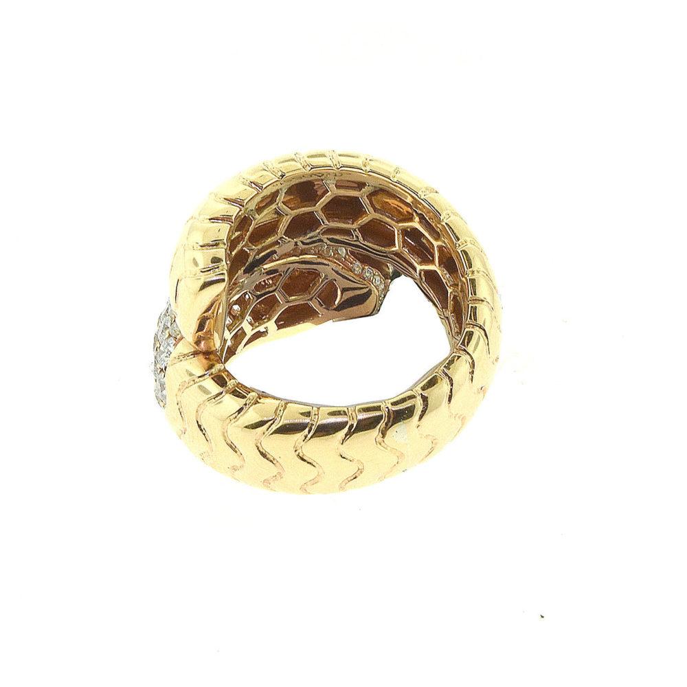 Taille brillant Bague panthère enveloppante en or jaune avec yeux en rubis et onyx en vente