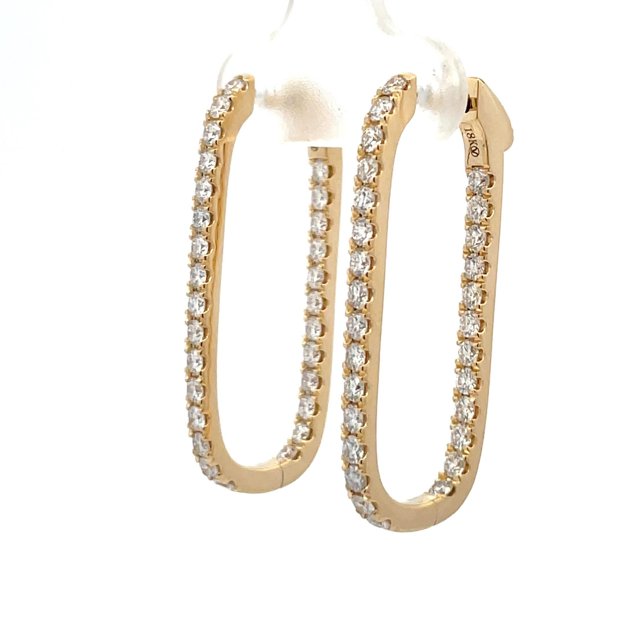 18 Karat yellow gold paper clip earring featuring 56 round brilliance weighing 1.52 carats, 5.7 Grams.
Color G
Clarity SI