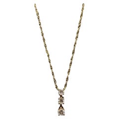 Collana con diamanti Past, Present, Future in oro giallo 10 carati - 0,20 carati di diamanti